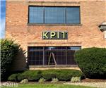 KPIT: Custom Internally Illuminated Channel Letters on Architectural Shoebox